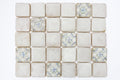 A blend of plain and decorative ceramic tiles on a white background
