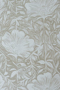 Floral wallpaper pattern in a light colour on a textured background