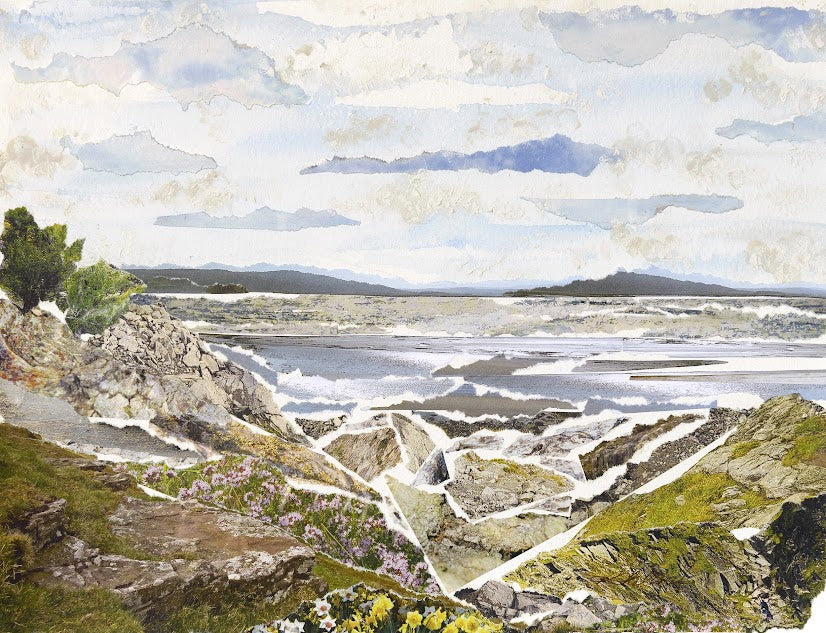 Landscape with rocky terrain, water body, and cloudy sky